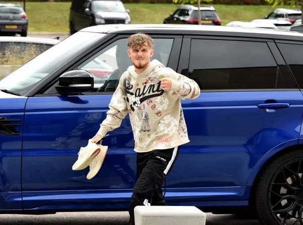 Harvey Elliott drives a Range Rover Sport car