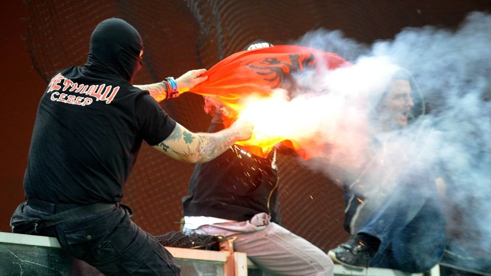 UEFA punishes Serbia after fans try to burn Albanian flag